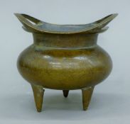 A Chinese bronze censer. 11.5 cm wide.
