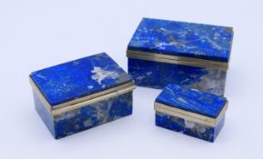 A set of three vintage lapis lazuli boxes The largest 6 cm wide.