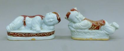A pair of Chinese porcelain headrests. Each 25 cm long.