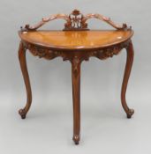 A modern demi-lune side table. 86 cm wide.