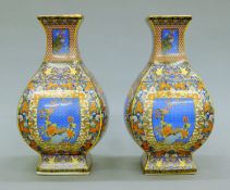 A pair of Chinese porcelain vases. Each 26 cm high.