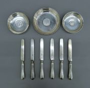 A 900 silver coin set dish, an 800 silver coin set dish,