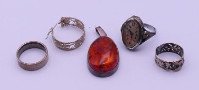 A small quantity of jewellery to include a silver watch ring, another silver ring,