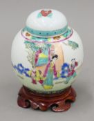 A Chinese porcelain ginger jar on stand. 17 cm high overall.