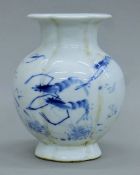 A Chinese porcelain vase decorated with crayfish. 19.5 cm high.
