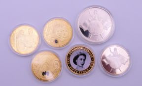 Six commemorative coins, five with certificates of authenticity,