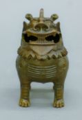 A Chinese bronze censer formed as a kylin (qilin). 8.5 cm high.