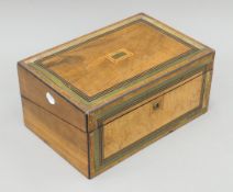 A Victorian brass-inlaid walnut writing slope. 35 cm wide.