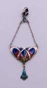 A silver Art Nouveau style pendant. 8.5 cm high.