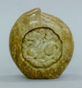 A Chinese jade carving of a dog-of-fo. 9 cm high.