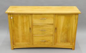 A modern oak sideboard. 134 cm long.