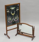 An Edwardian mahogany-framed fire screen and a toilet mirror. The former 45 cm wide.