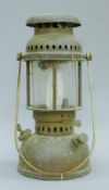 A vintage brass paraffin lamp. 31 cm high.