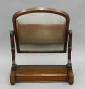 A Victorian mahogany dressing table mirror. 58 cm wide.