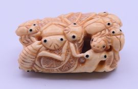 A carved bone insect carving. 4.5 cm long.