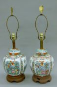 A pair of Chinese porcelain lamps. Each 69 cm high overall.