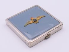 A vintage compact set with the R.A.F insignia. 6.