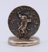 A silver menu holder decorated with a polo scene. 3.5 cm high.