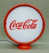 A 'Coca Cola' globe lamp. 48 cm high.