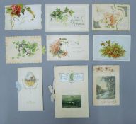 A collection of Victorian greetings cards, including paper lace examples.