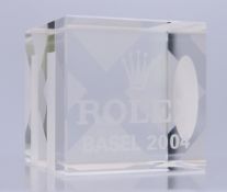 A Rolex Basel 2004 glass paperweight with labels for Venezia Salviati,