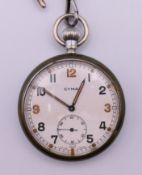 A World War I military CYMA pocket watch marked G.S.T.P T19758 to reverse and chain.