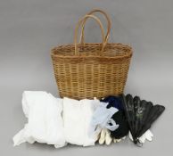 A vintage Mini side basket, various lace and linen, gloves and fans. The former 38 cm wide.