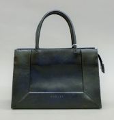 A Radley leather handbag. 29 cm wide.