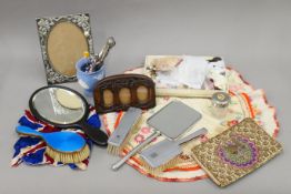 A quantity of hat pins, a photograph frame, hand mirrors, etc. The Wedgwood vase 11 cm high.