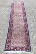 A handmade Persian Moud runner. 385 x 80 cm.