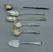 Various silver spoons and a baleen-handled toddy ladle. The latter 40.5 cm long. 363.