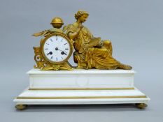 A 19th century gilt bronze-mounted marble mantle clock. 41 cm wide.