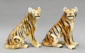Two large pottery tigers. Each 36 cm high.