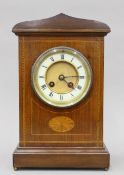 An Edwardian inlaid mahogany mantle clock. 31 cm high.