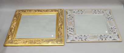 Two decorative wall mirrors. The largest 85 x 74 cm.
