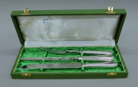 A boxed Arthur Price sterling silver-handled carving set. The case 36.5 cm long.