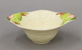 A Clarice Cliff porcelain bowl. 13 cm wide.