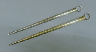 Two Georgian silver meat skewers, each bearing the crest of Major General Sir Thomas Hislop,