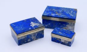 A set of three vintage lapis lazuli boxes. The largest 6 cm wide.