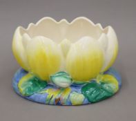 A Clarice Cliff crocus porcelain vase. 22 cm wide.