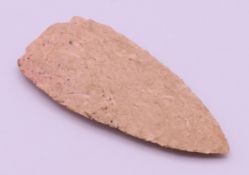 A stone arrowhead, bearing label inscribed found in the state of Wisconsin,