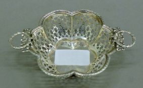 A twin-handled silver bonbon dish. 12.5 cm wide. 52.4 grammes.