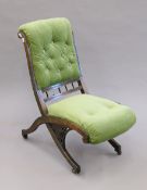 A Victorian upholstered nursing chair and two other chairs. The former 36 cm wide.