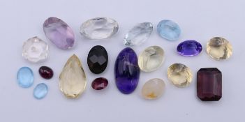 A collection of various gemstones. The largest 2 cm long.