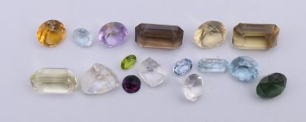 A collection of various gemstones. The largest 1.8 cm long.