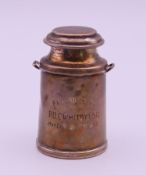 A miniature silver cream pail with presentation inscription. 6 cm high.