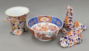Four Chinese Imari porcelain pieces including seal and large bowl, all with makers' marks.