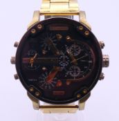 A Diesel gentlemen's wristwatch. 6 cm wide including crowns.