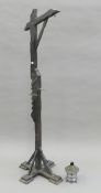 An Arts and Crafts wooden standard lamp. 152 cm high.