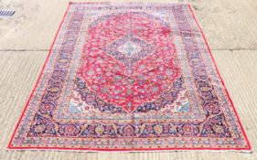 A Persian handmade Kashan carpet. 362 x 246 cm.